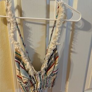 Cropped going out top